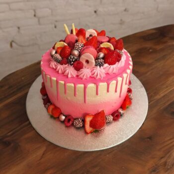 Pink Chocolate Drip Cake with Fresh Fruit & Macarons