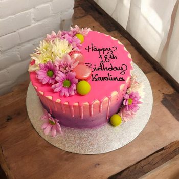 Chocolate Pink Drip Cake with flowers