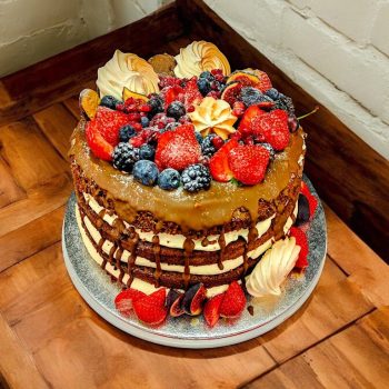 Naked Cake with fruits and chocolate decorations