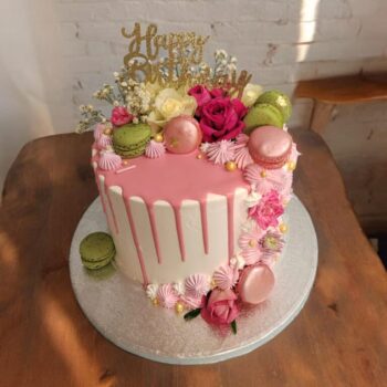 Chocolate Drip Cake with Macarons and Fresh Flowers