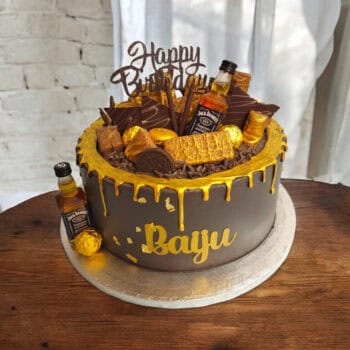 Indulge in Sophistication: Golden Drip Whisky Cake (18+)