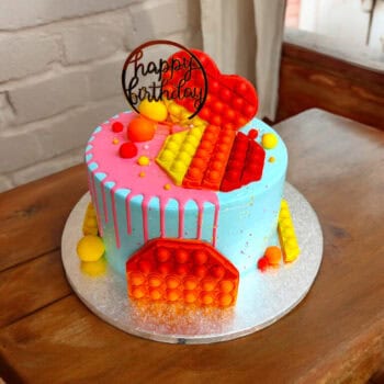 Pop it drip birthday cake
