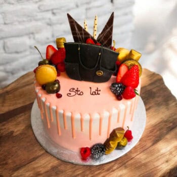 Cake with a handbag, pink chocolate drip and fruits
