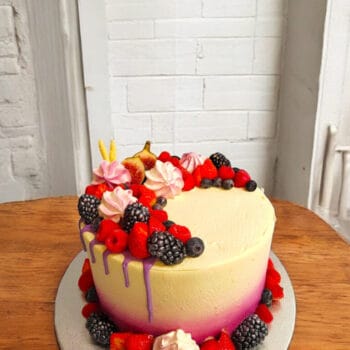 Purple Chocolate Drip Cake with Fresh Fruit