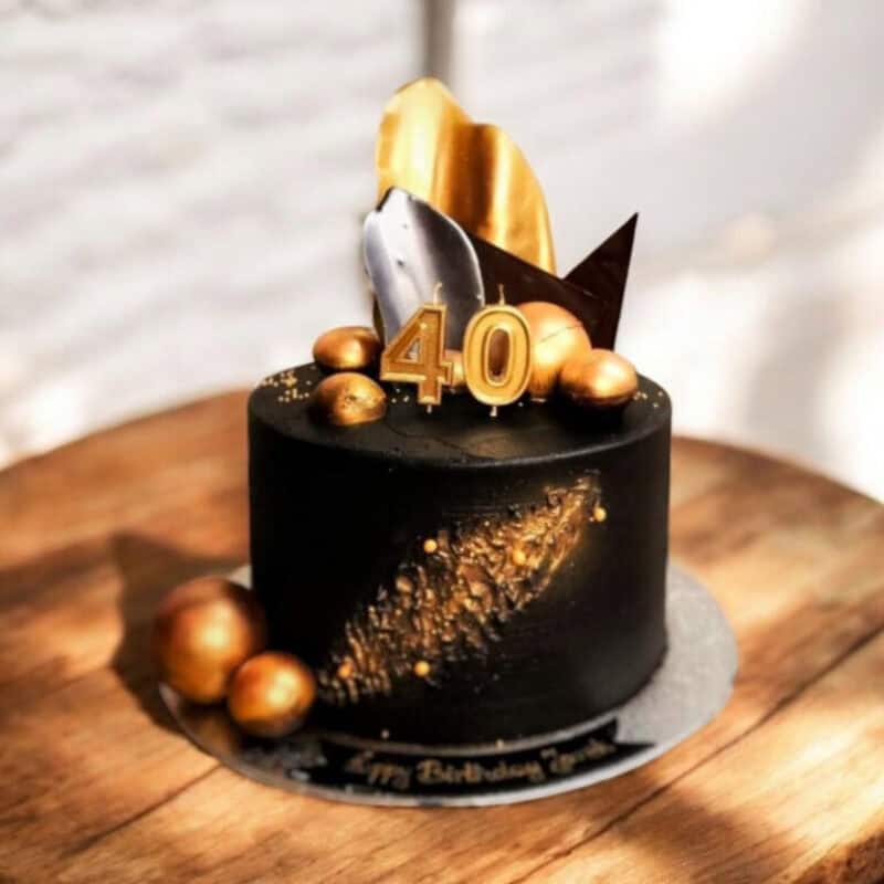 Black Cake with gold accents