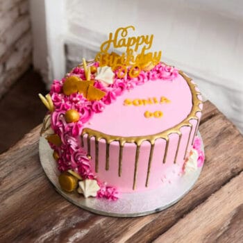 Pink Chocolate Drip Cake with Meringues & Macarons
