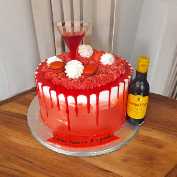 A glass of wine cake in red 18+